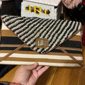 NWOT unique envelope clutch. Made of acrylic, plastic & cotton. Very cute piece!